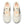 A pair of New Balance women's running trainers with white uppers, black, orange, and yellow accents, and a gray outsole.