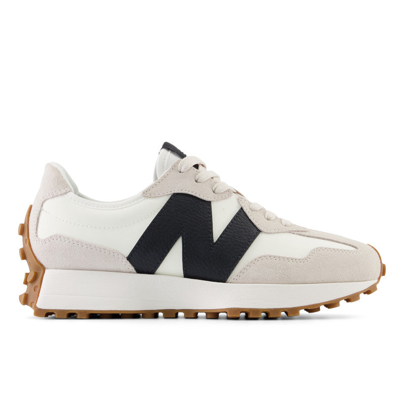 The lateral view of this Women's NB 327 is almost all grey adn white with a dark "N" logo