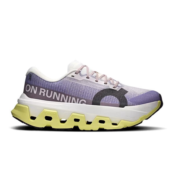 Purple, white and grass green running shoe with white sole on a transparent background.