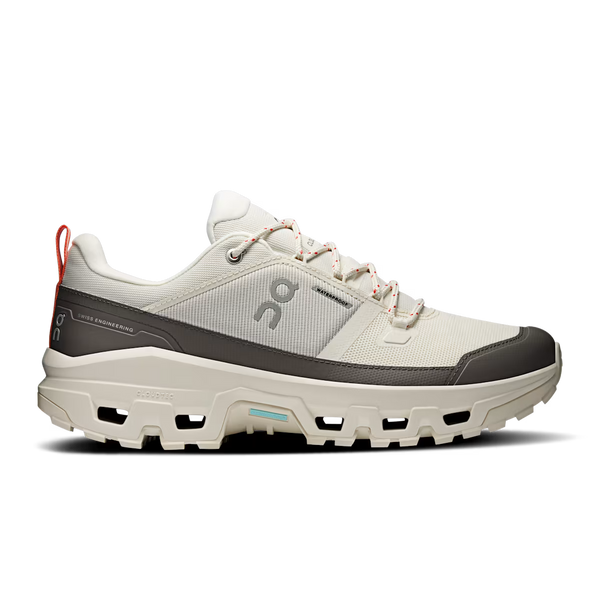 Grey and cream hiking shoe on a white background