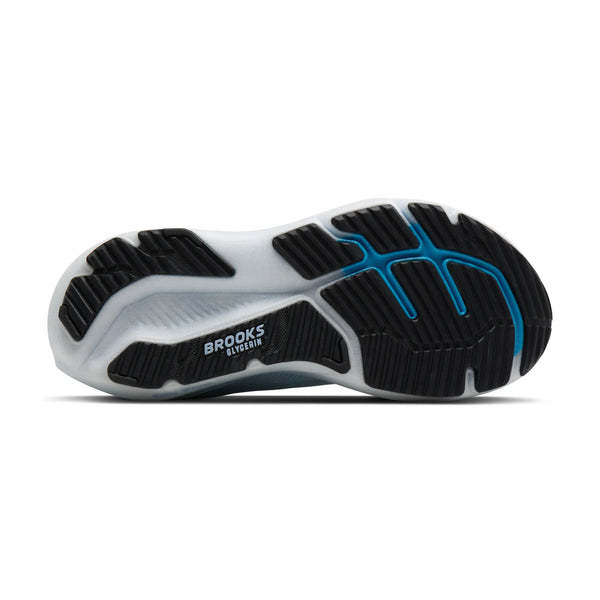 Close-up of a running shoe sole with 'Brooks' branding on a white background
