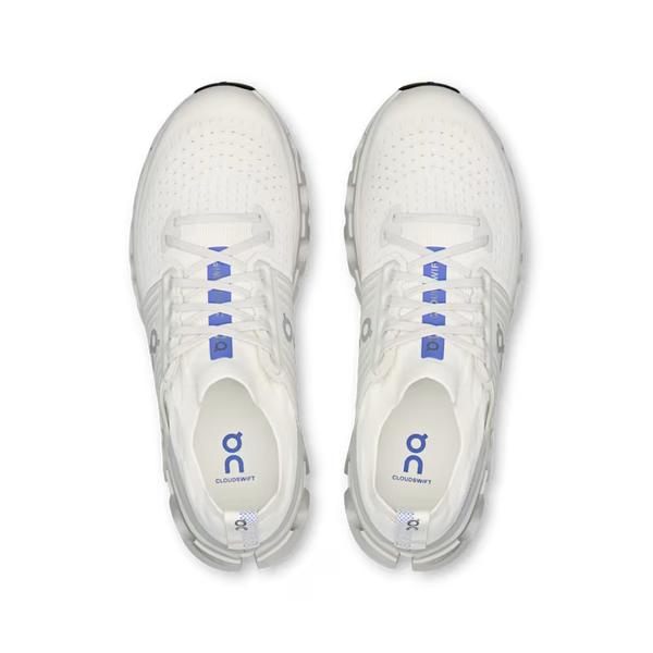 White sneakers with blue accents on a transparent background
