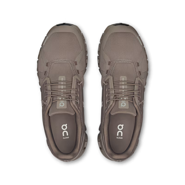 A pair of On Cloud running shoes in a taupe brown color, shown from a top-down view on a plain white background.
