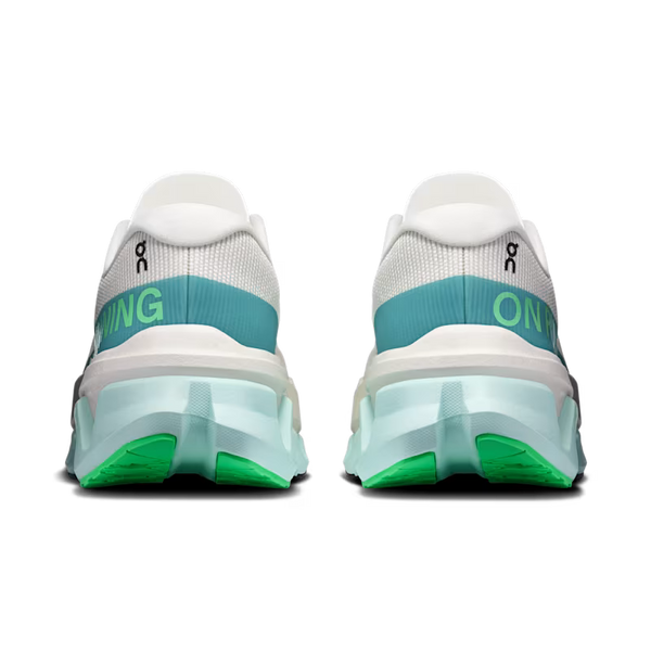 Rear view of a pair of On running shoes showing the thick translucent midsole, white mesh upper, teal and green branding details, and bright green outsole tips on a white background.