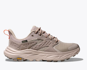 Beige hiking shoe with brand logo on a white background