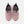A pair of New Balance running shoes in pink and black, shown from a top-down view on a solid white background.