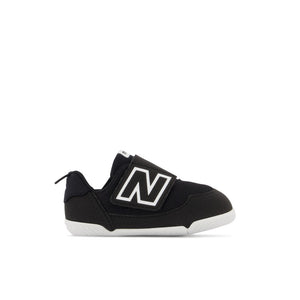 Black infant sized sneaker with a white logo on a white background.