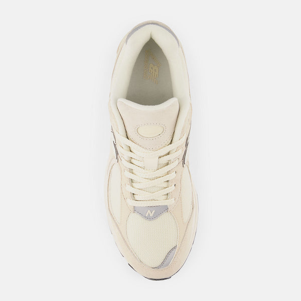 Beige sneaker on a light gray background
