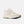 Beige sneaker with New Balance logo on a white background