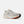 The men's new balance 860 has a grey upper and orange pops on the outsole.