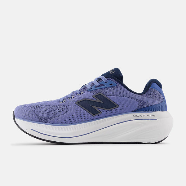 Blue running shoe with white sole on a white background
