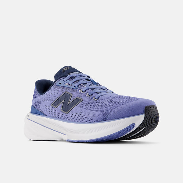 Blue running shoe with white sole on a light gray background