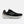 Black and white  New Balance running shoe with white sole on a white background.