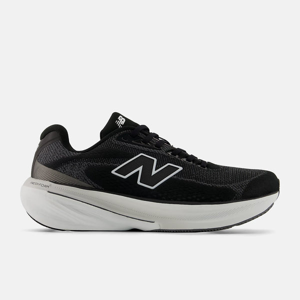 Black and white  New Balance running shoe with white sole on a white background.