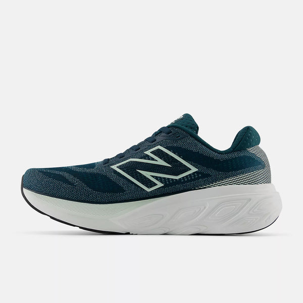 Blue'ish and green running shoe with white sole on a light gray background