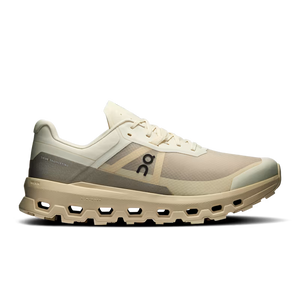 Beige and white trail running shoe on a transparent background