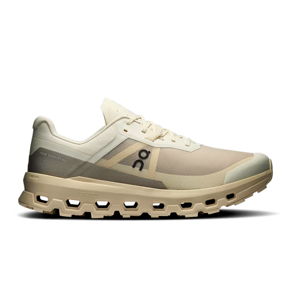 Beige and white trail running shoe on a transparent background