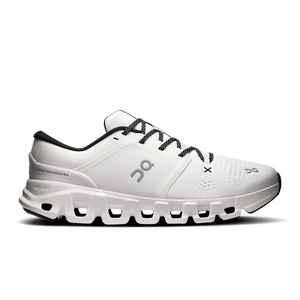 White and black gym shoe with black laces on a white background