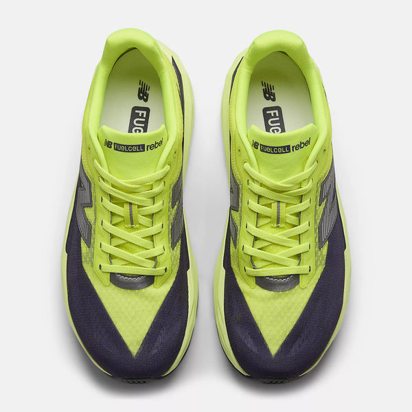The top down view of this Rebel V4 has a neon green around the heel and over the instep.