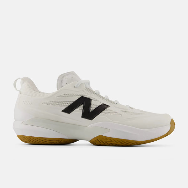A New Balance athletic shoe in white with a prominent black 'N' logo on the side and a gum-colored outsole, shown against a light gray background.