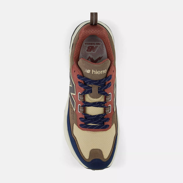 Sneaker with brown, blue, and beige color scheme on a white background