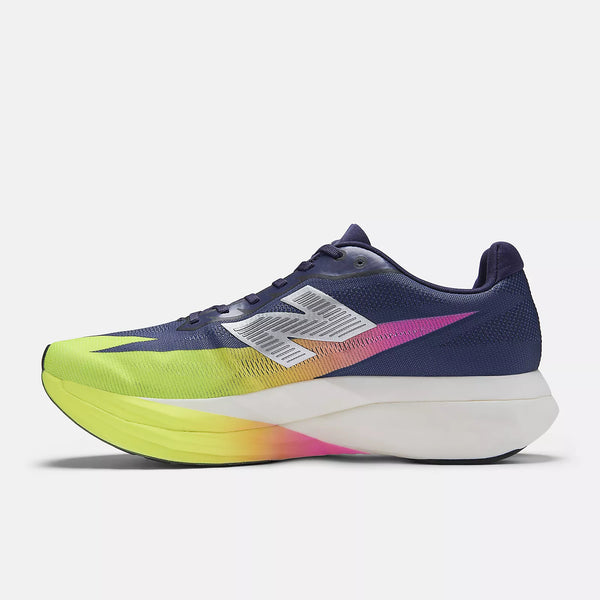 Navy and green running shoe with New Balance logo on a white background