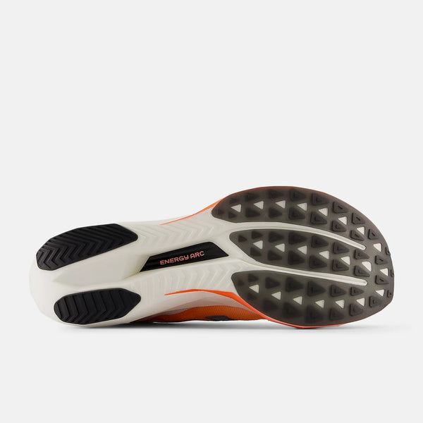 Orange and white running shoe on a white background