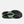 The outsole of a New Balance green running shoe with black sole on a white background