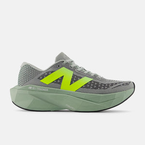 Gray running shoe with green accents on a white background