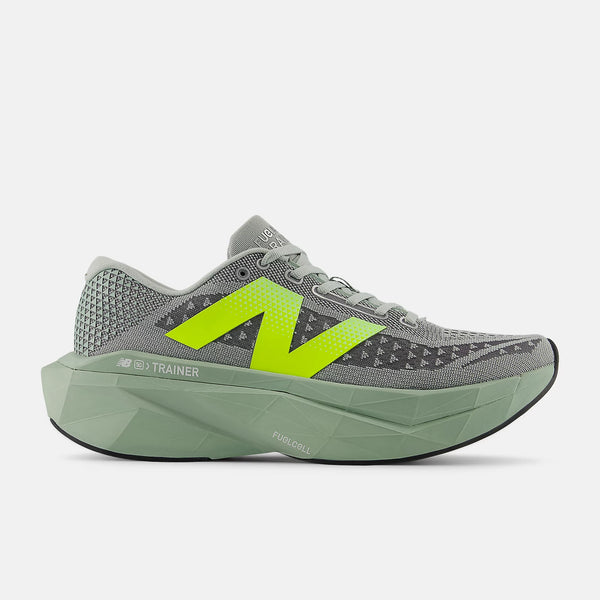 Gray running shoe with green accents on a white background