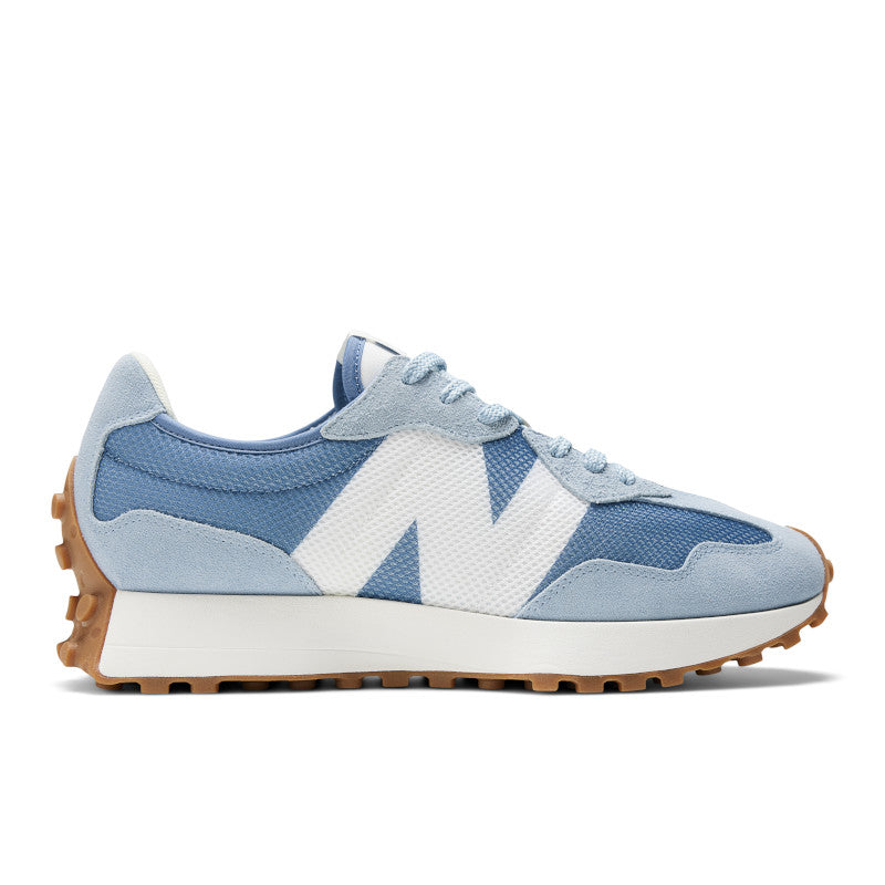 This men's 327 rom the side features a couple different tones of light blue combined with a big white "N" for the NB logo