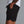 Person wearing black shorts with 'Municipal' branding on a gray background