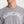 Gray t-shirt with 'MUNICIPAL' text worn by a person on a white background