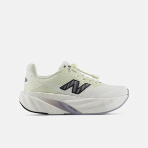 A New Balance running shoe in a light cream/off-white colorway with a black and white 'N' logo on the side, set against a solid light gray background.