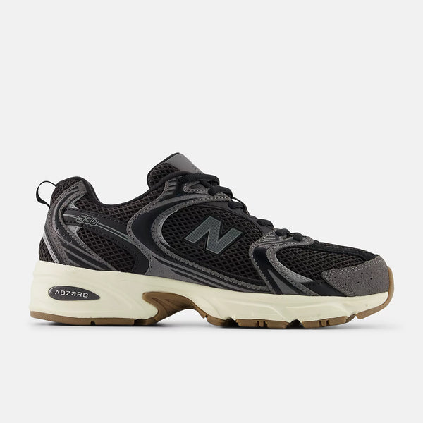 Black and gray sneaker with New Balance logo on a white background