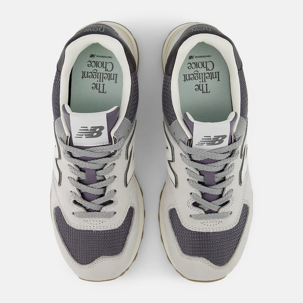 Gray New Balance sneaker on a white background