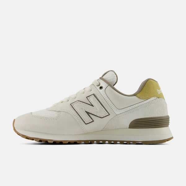 Beige sneaker with brown accents on a white background