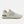 Beige sneaker with New Balance logo on a white background