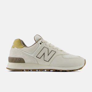 Beige sneaker with New Balance logo on a white background