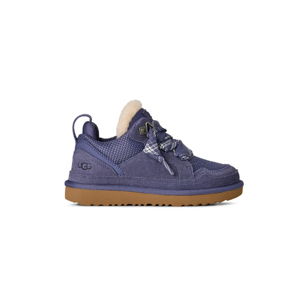 Kids purple sneaker on a white background