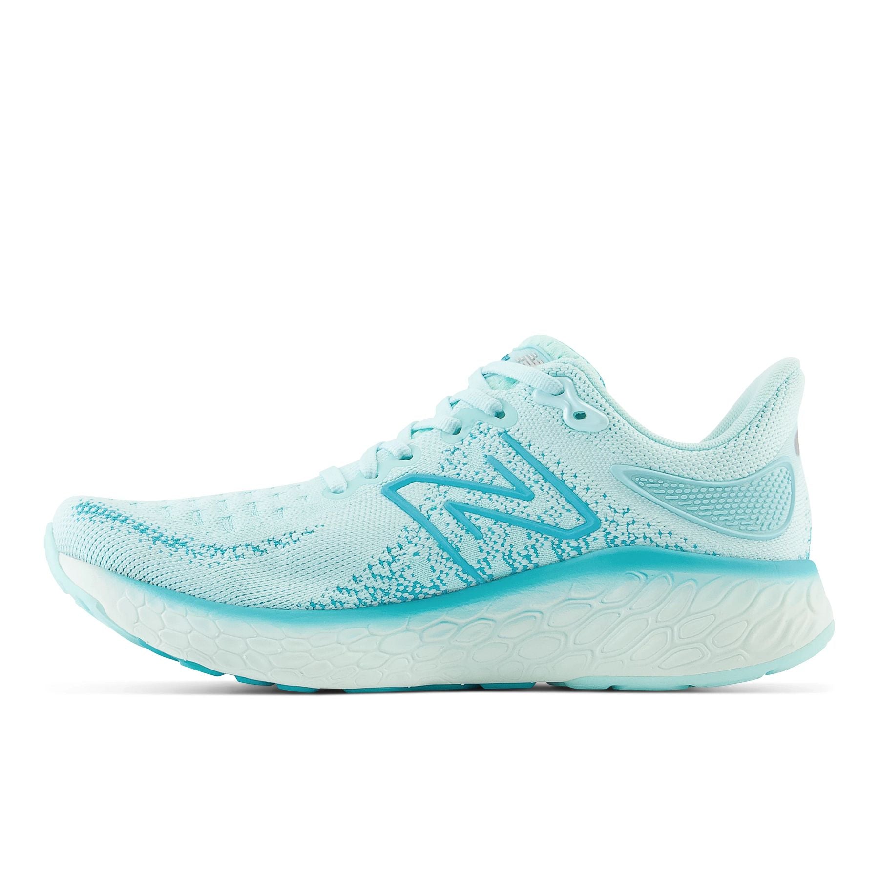Medial view of the Women's 1080 V12 by New Balance in the color Bright Cyan/Virtual Blue