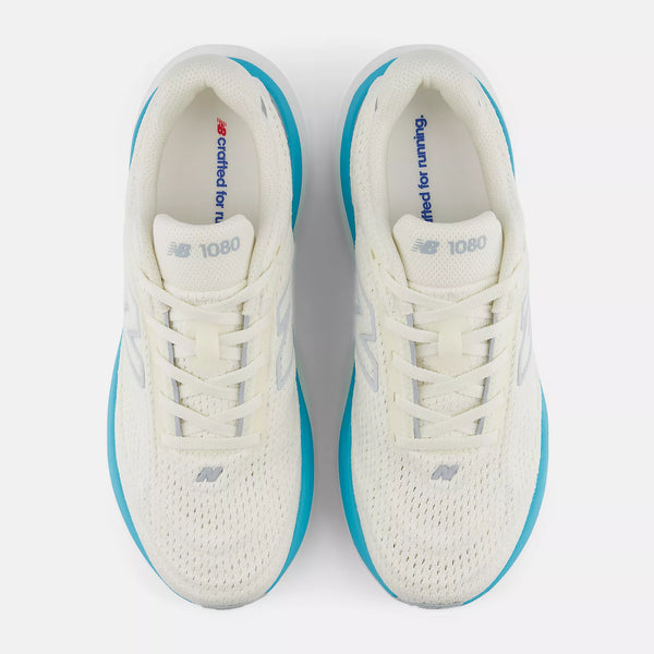 White sneakers with blue accents on a white background