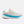 White running shoe with blue sole on a white background