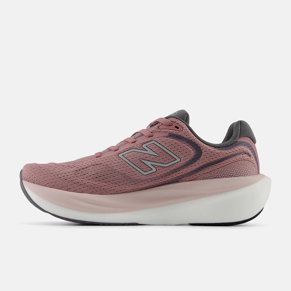 Pink running shoe with New Balance logo on a white background