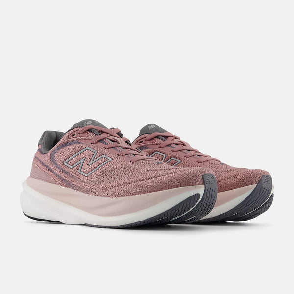 Pair of pink running shoes with gray accents on a white background