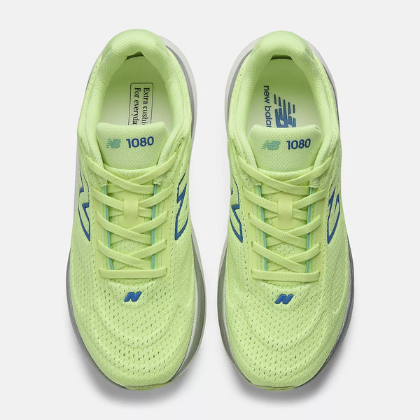 Pair of neon green running shoes with blue accents on a white background