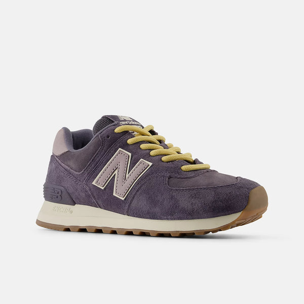 Women's 574 new balance shoe with gold laces