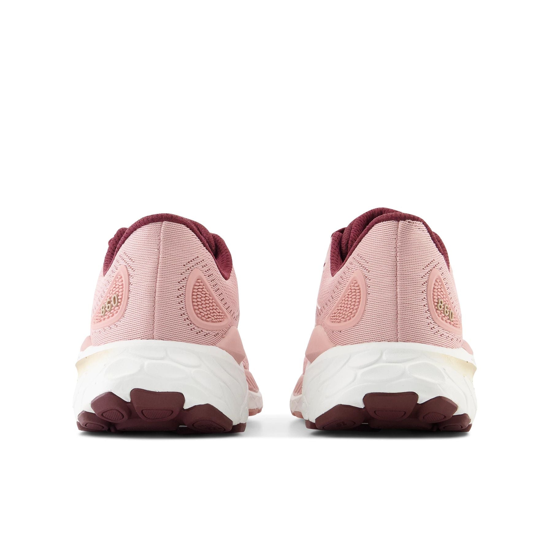 Back view of the Women's 860 V13 by New Balance in the color Pink Moon/Burgandy