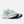 Light blue running shoe with New Balance logo on a white background