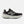 Black running shoe with white sole on a light gray background